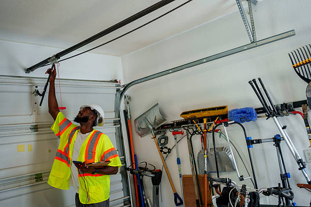 Professional Garage Door Panel Replacement technician working in Sutherlin, OR